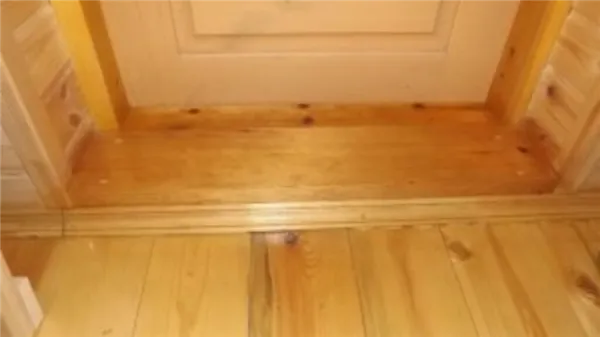 Как сделать порог у входной двери в квартире