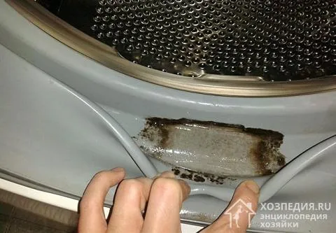 Снимаем лоток для моющих средств на стиральной машине