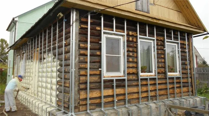 отделка деревянного дома недорого